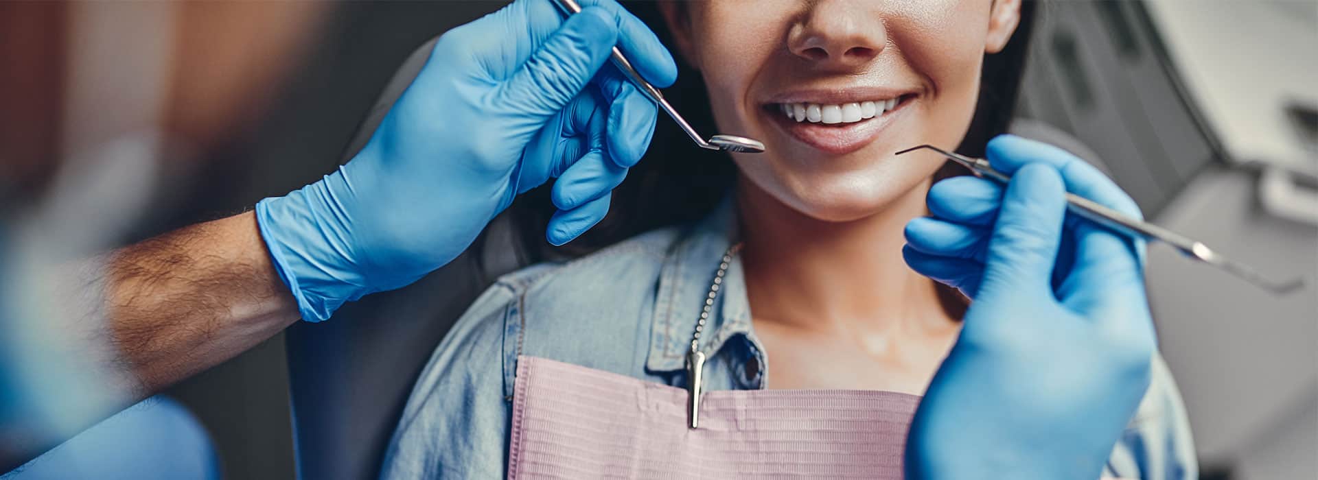 Smiling patient during a dental exam